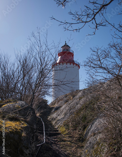 Landsort most southern point in Stockholm archipelago lighthouse, pilots and a history as a point of defense since hundreds of years. Today bird watching and recreation. photo