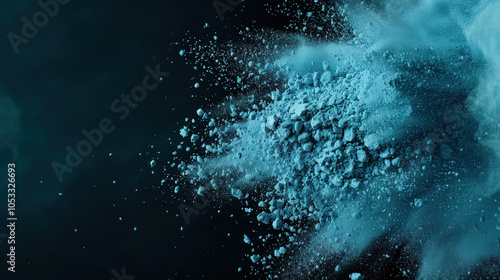 vibrant deep blue powder explosion creates stunning visual against dark background, showcasing dynamic movement and texture of particles. contrast enhances dramatic effect of scene