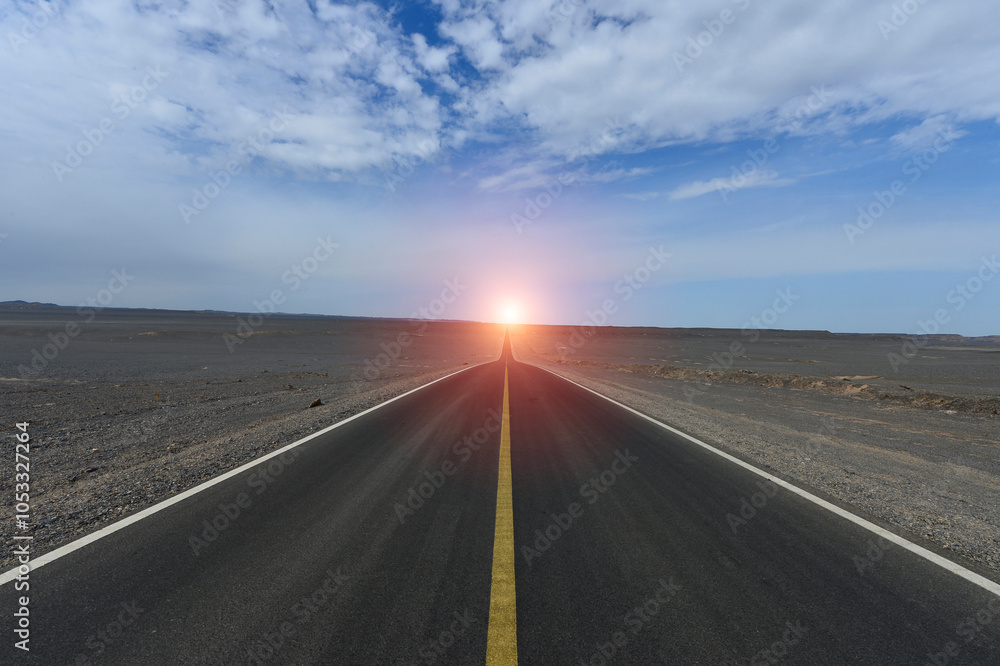 Fototapeta premium Desert road sand dunes in Xinjiang, China