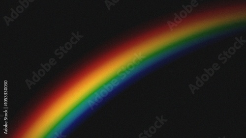 Rainbow ray light on black background with grainy overlay. Crystal flare abstract effect.	