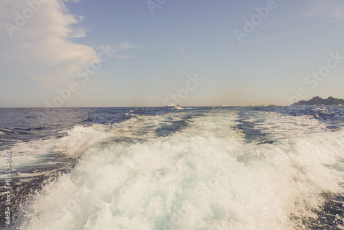 Behind a speed boat in the sea 