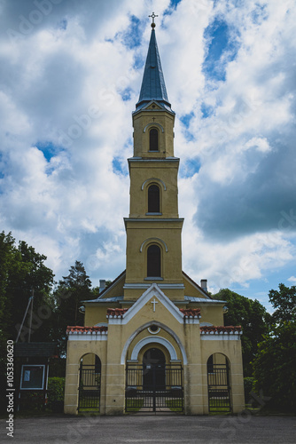 high tower of church in Latvia. Zalenieki village photo