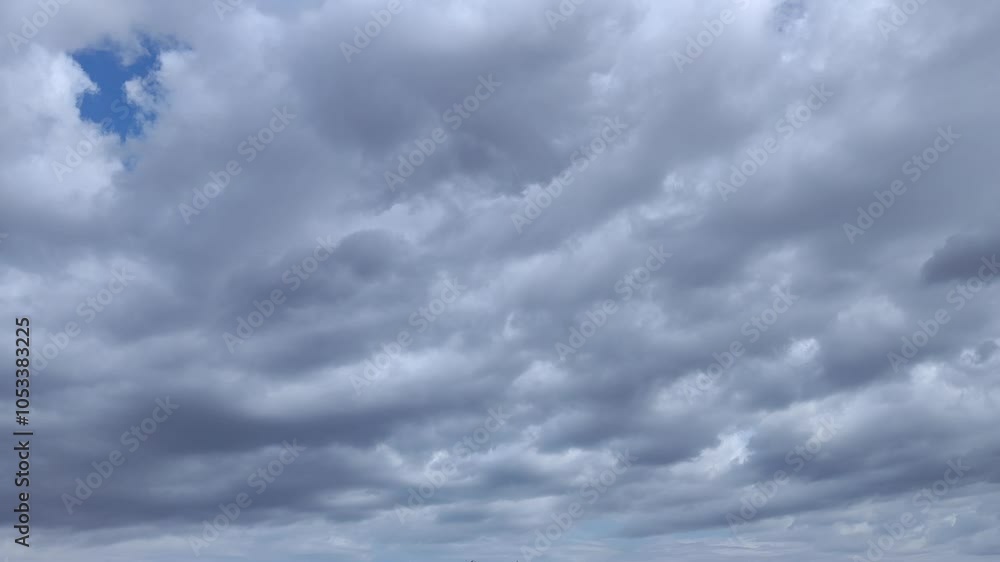 Very gray cloud balls move across the sky blue Very gray cloud balls move across the sky blue