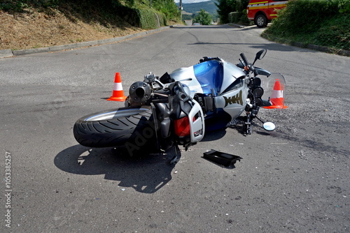 Motorcycle accident, crash at sunny day. Serious accident. Accident, close-up. Driving hazards. Collisions with another vehicle. Motorcycle crash concept.