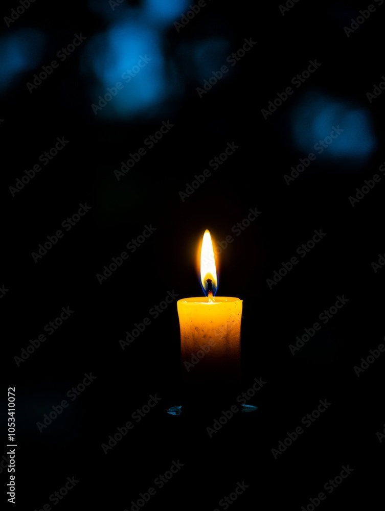 Candlelight Hope: A single candle flickers brightly against a backdrop of deep blue, symbolizing resilience, hope, and the enduring power of light in the face of darkness. Candlelight Hope: A single candle flickers brightly against a backdrop of deep blue, symbolizing resilience, hope, and the enduring power of light in the face of darkness.