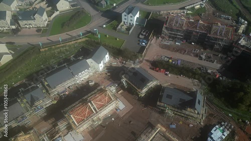 Paignton, South Devon, England: DRONE VIEWS: The second phase of a new build housing development called Inglewood under construction. Paignton is a popular UK holiday resort (Clip 2).