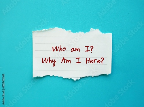Billede på lærred Torn paper on blue background with handwritten text Who am I? Why Am I Here?  qu