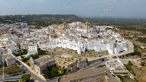 Wallpaper Mural Aerial view of Old Town of Ostuni, in the province of Brindisi, in Puglia, Italy. Ostuni's citadel is commonly referred to as "the White Town" for the color of the houses. Torontodigital.ca
