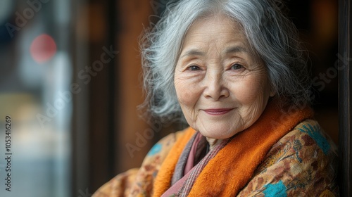 Japanese elderly woman with a gentle smile and a shawl photo