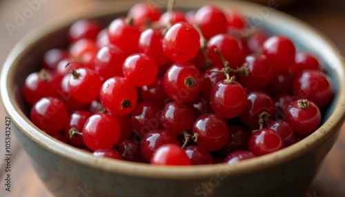  Bright red berries in a bowl ready to be enjoyed