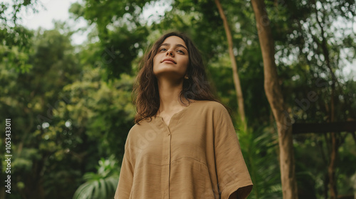 A lightweight tunic-style shirt worn by an Indian female model, perfect for breezy, semi-casual fashion promotions. 