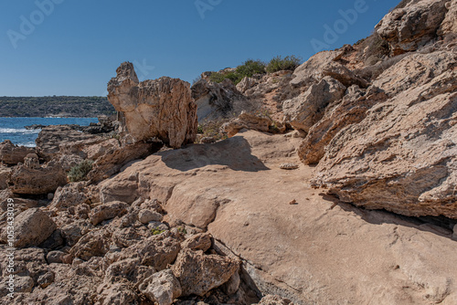 Konnos Bay Nature Trail, from Agioi Anargyroi Church to the Cyclops Cave, along the rugged coastline with beautiful sea and coast views, Cape Greco National Forest Park, Ayia Napa, Cyprus    photo