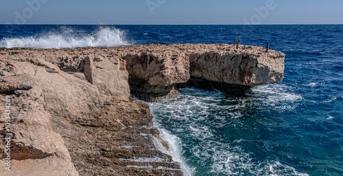 Konnos Bay Nature Trail, from Agioi Anargyroi Church to the Cyclops Cave, along the rugged coastline with beautiful sea and coast views, Cape Greco National Forest Park, Ayia Napa, Cyprus    photo