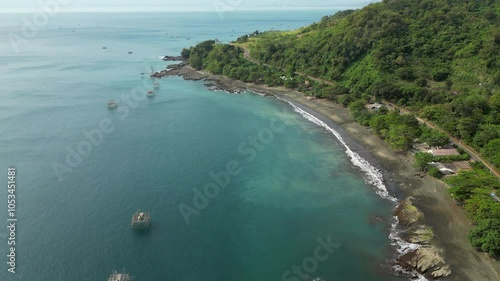 Drone Rise Track Forward Over Beautiful Pelabuhan Ratu Coastline Sukabumi Indonesia 4K 60FPS photo