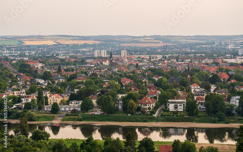 View from high point of beautiful city of Dresden. Houses, river Elbe. Germany. Ferry, crossing. Famous tourist spot