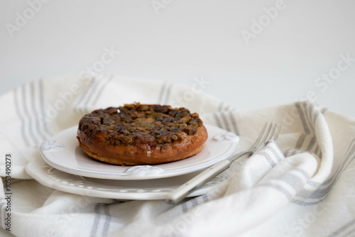 Close up Pistachio Kouign Amann, sweet Breton cake , French Pastry photo