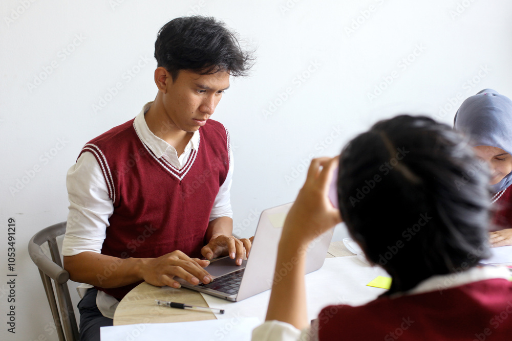 High School Students Doing School Work Together at The Study Room High School Students Doing School Work Together at The Study Room