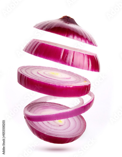Red onion slices or chunks floating or flying isolated white background