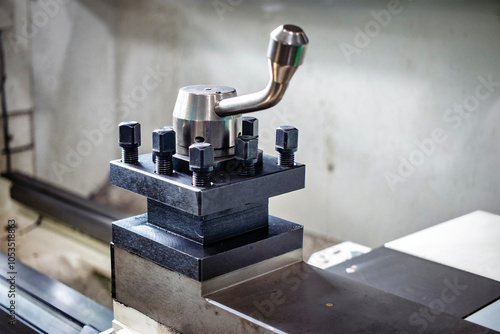 Photos Lathe machine setup in a manufacturing facility showcasing precision engineering