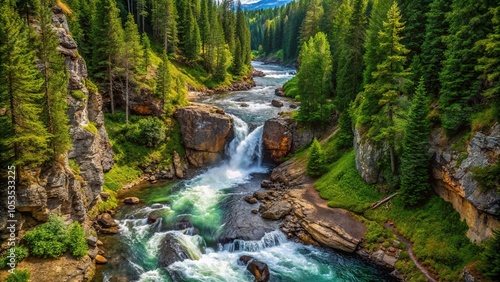 Wild river waterfall flowing through calm mountain forest