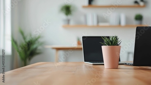 Wallpaper Mural Coworkers Collaborating on Project in Modern Open Office Space with Laptop on Desk Surrounded by Minimalist Decor Plants and Shelves Torontodigital.ca