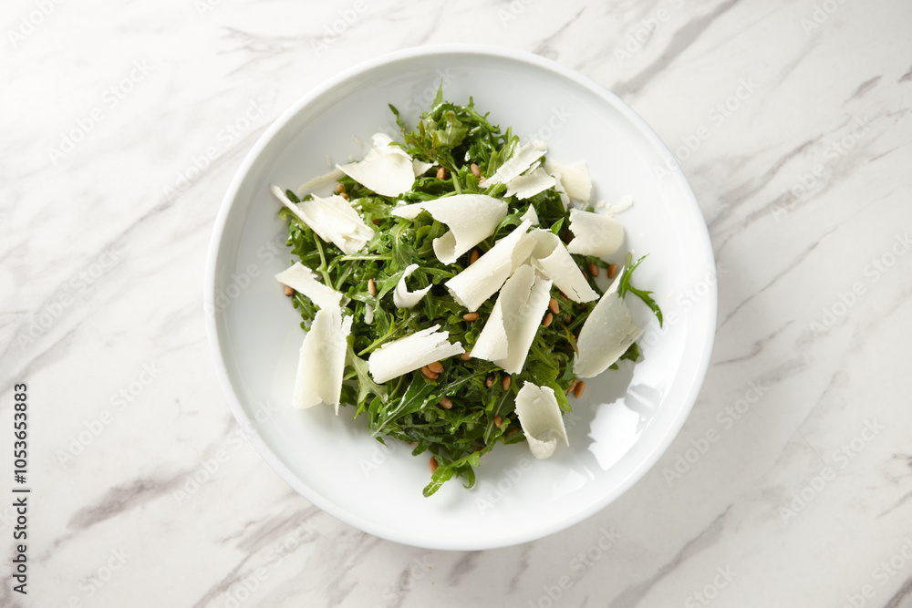 green salad mixed with nuts and largely grated cheese green salad mixed with nuts and largely grated cheese