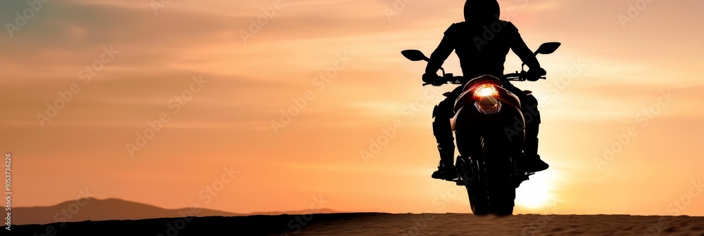 Fototapeta premium A person silhouetted against a sunset backdrop, standing next to a motorcycle