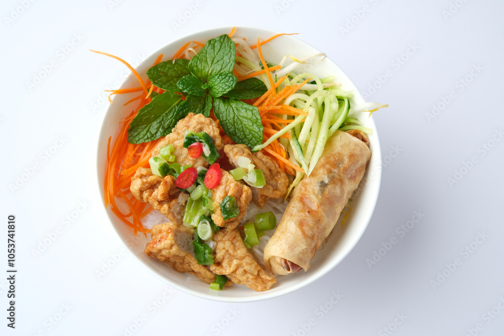 Bun Cha Gio bowl topped with fried spring roll and Cha Lua. Bun Cha Gio bowl topped with fried spring roll and Cha Lua.