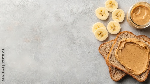 Almond butter spread on whole grain toast with bananas, vegan ingredients, vegan breakfast concept photo