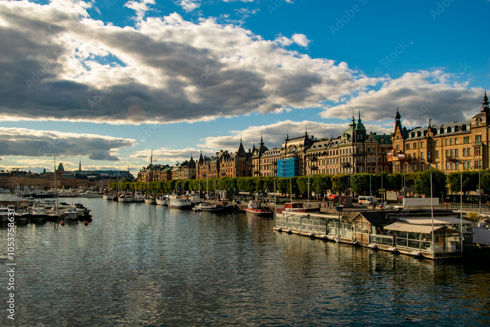 Fototapeta premium A Walk Through Time: Buildings by the Water