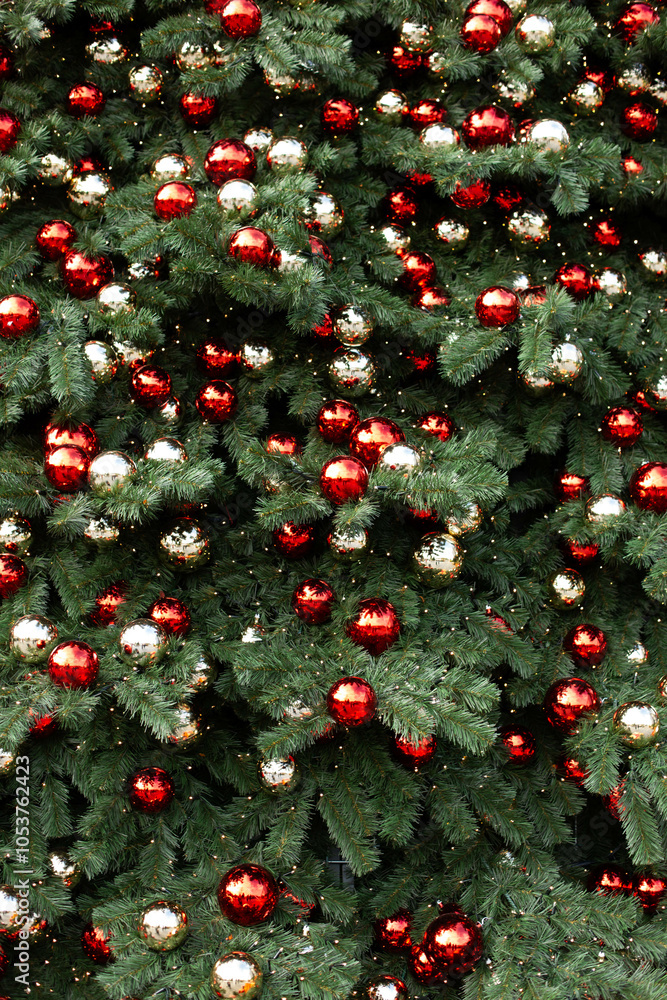 Beautiful Christmas tree with red balls decor close-up. Beautiful Christmas tree with red balls decor close-up.