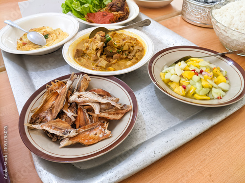 A collection of foods served on the Kalimantan dinner table photo