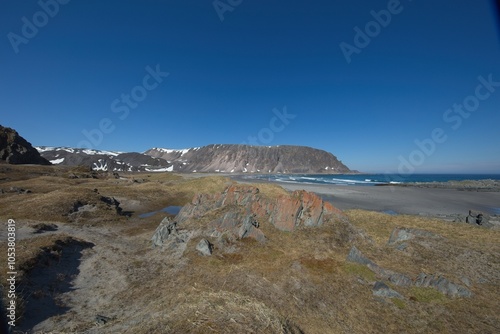 Landscape view of Sandfjorden in sunny summer weather, Varanger Peninsula, Norway. photo