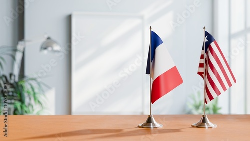 FLAGS OF FRANCE AND LIBERIA ON TABLE photo