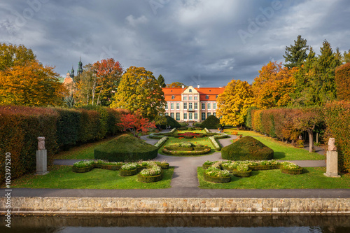 Autumn alley with yellow leaves in the public park in Gdansk Oliwa, Poland