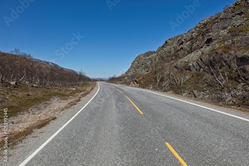 View of Ravttebelgeainu E6 road in sunny summer weather, Norway.