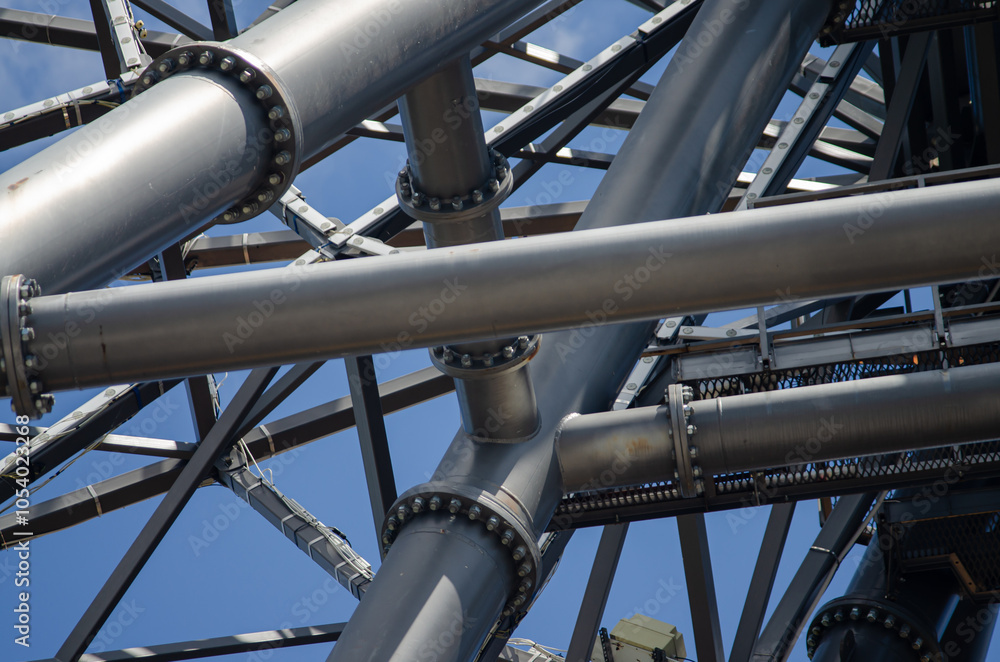 Photo of a metal structure made of welded beams and pipes. Photo of a metal structure made of welded beams and pipes.