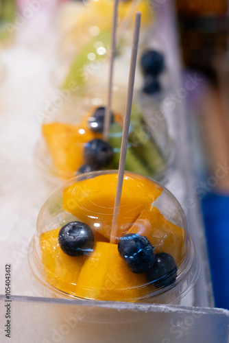 a cup of fresh fruit photo