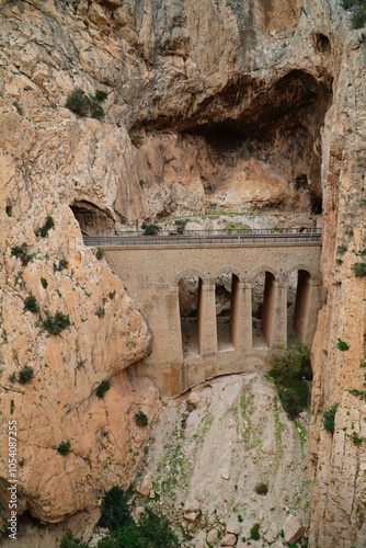 Vertical rock faces on the Kings Walkway or El Caminito del Rey in the province of Malaga, Andalusia, southern Spain. photo