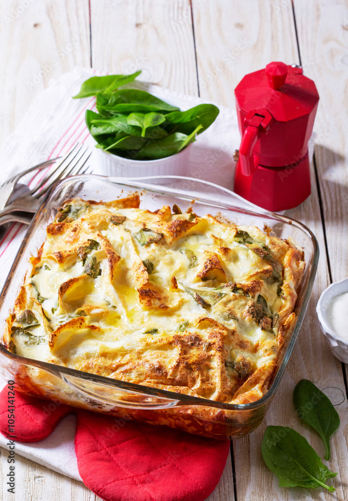 Traditional Bulgarian or Balkan pie banitsa made from filo dough, cream cheese and spinach.