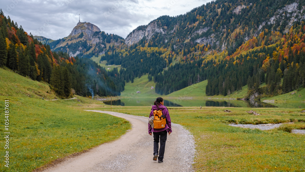 Fototapeta premium Exploring the serene beauty of Falensee in Appenzell, Switzerland during autumn strolls