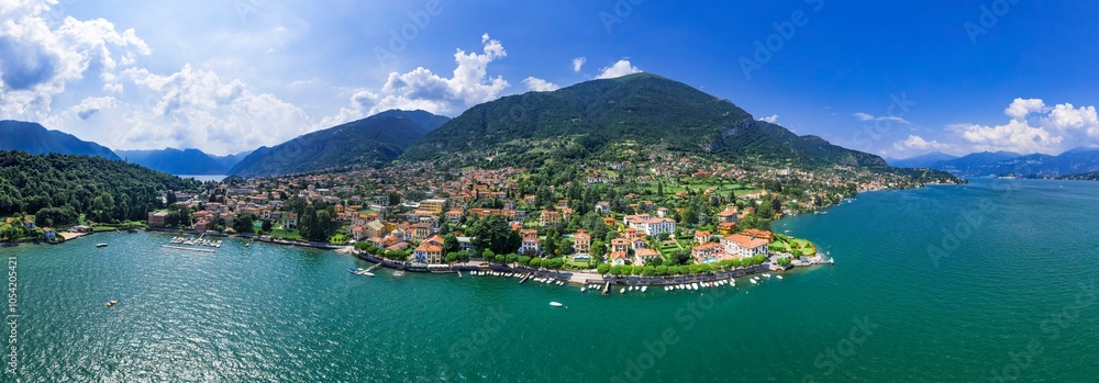 Fototapeta premium beautiful lakes of northern Italy Como lake - romantic Lago di Como, Tremezzina town, destination for famous Villa del Balbinello. aerial drone panoramic view