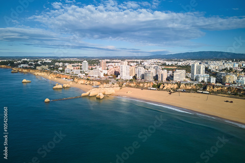 Aerial view of Portimao city and its famous beach Praia Da Rocha  in autumn, Portugal
