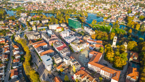 Bihać, a picturesque city in Bosnia, showcases vibrant autumn colors along the pristine River Una. The natural beauty of the area is accentuated by the golden and amber leaves that frame the riverbank photo