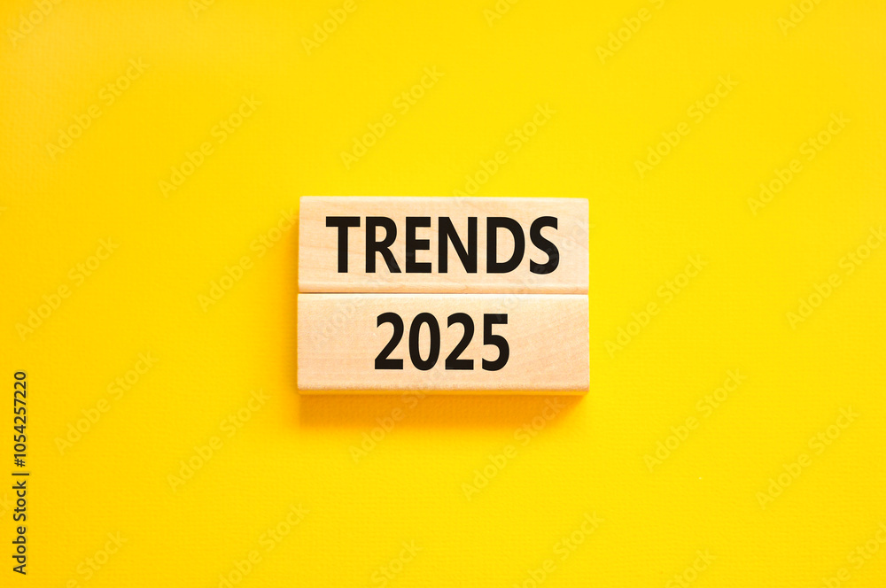 Planning trends 2025 new year symbol. Concept words Trends 2025 on beautiful wooden blocks. Beautiful yellow background. Business trends 2025 new year concept. Copy space. Planning trends 2025 new year symbol. Concept words Trends 2025 on beautiful wooden blocks. Beautiful yellow background. Business trends 2025 new year concept. Copy space.