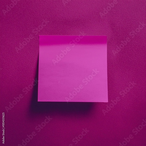 Pink Sticky Note on Textured Background
