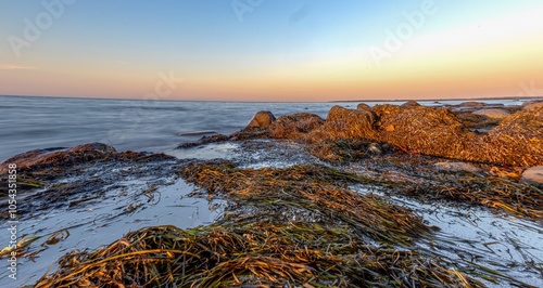 Obraz na płótnie Fantastic sunset on the cliffs of the Baltic Sea on the island of Poel w salonie
