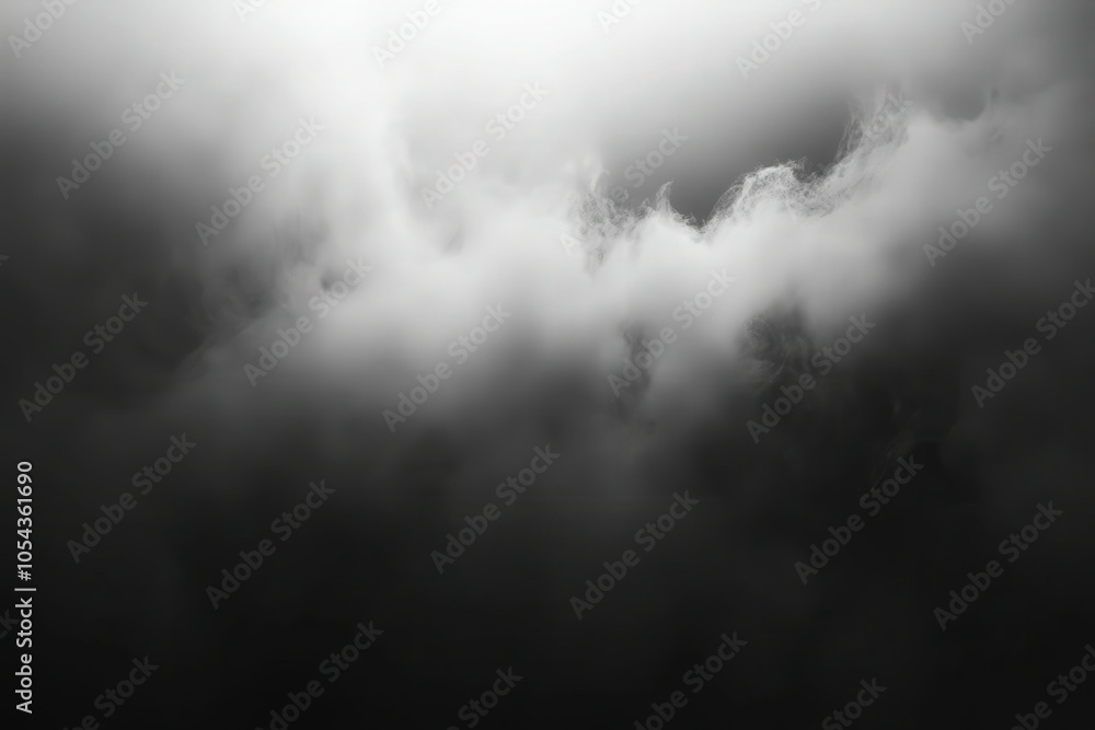 A dramatic cloudscape captured in black and white, showcasing swirling mist against a bright light backdrop during early morning A dramatic cloudscape captured in black and white, showcasing swirling mist against a bright light backdrop during early morning