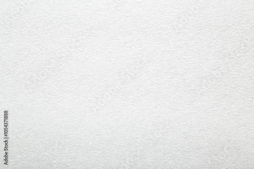 White polythene bubble insulation underlay film surface background for floor, wall or ceiling. Material for house thermal protection. Closeup. Top down view.
