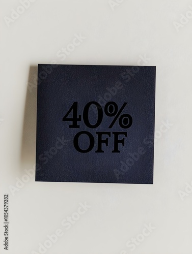 Black '40% OFF' Text on a Black Square Paper Note. White Background 